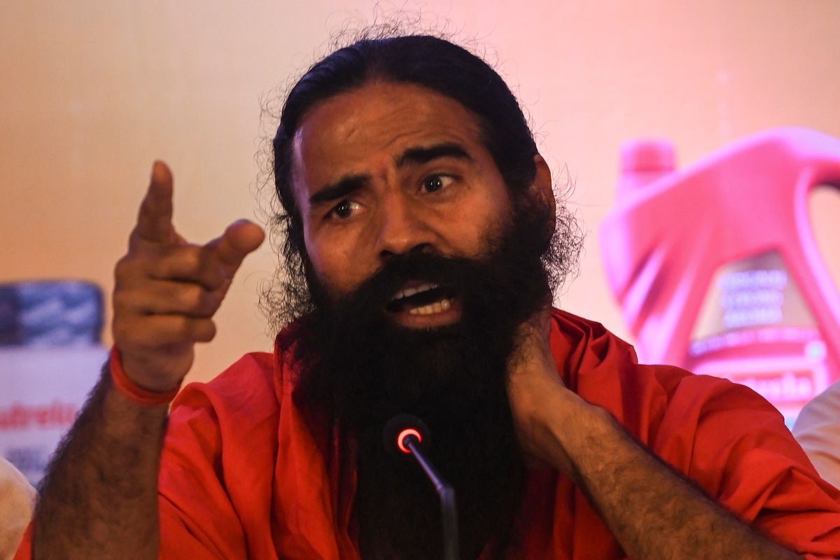 Patanjali Ayurveda company led by yoga guru Ramdev banned from running ‘misleading’ advertisements in India
